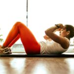 시니어 바레 자격증, 지금 시작해야 하는 이유 woman exercising indoors