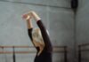 바운스(Bounce)와 펄스(Pulse), 정말 같은 동작일까요? Full body of faceless graceful ballet dancer doing twine posture with hands above head in studio